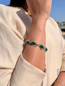 Emerald cabs and pear diamond bracelet