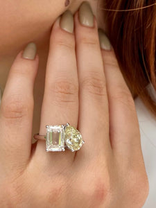 4 Carat Emerald cut and 3 Carat Yellow Pear Diamond Ring