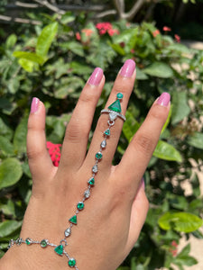 Diamond and emerald hand bracelet